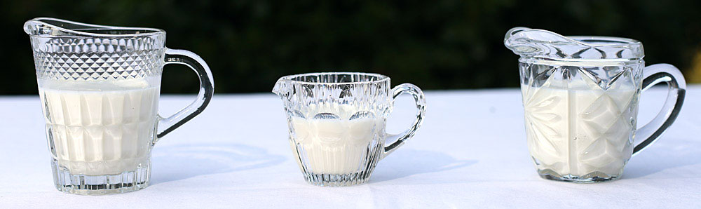 Glass vintage milk jug